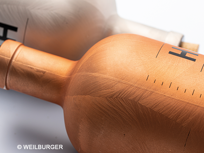 white and orange shimmering bottles